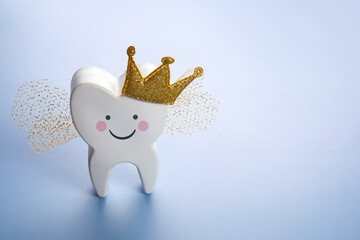National Tooth Fairy Day. Children tooth fairy. Cute tooth with wings, a crown.