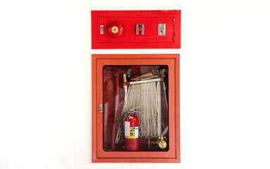 Fire fighting equipment for fire protection. Emergency button and fire alarm bell
on a white...