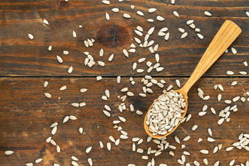 Sunflower seeds in a wooden spoon