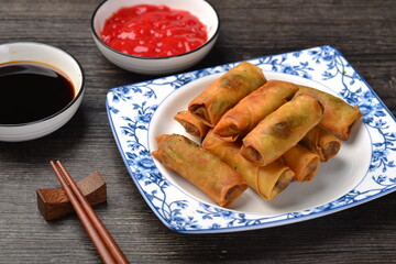 Delicious fried spring rolls and sweet chili sauce