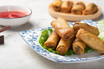 Delicious fried spring rolls and sweet chili sauce