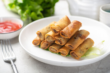 Delicious fried spring rolls and sweet chili sauce