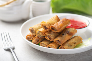 Delicious fried spring rolls and sweet chili sauce