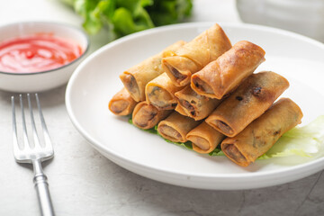 Delicious fried spring rolls and sweet chili sauce