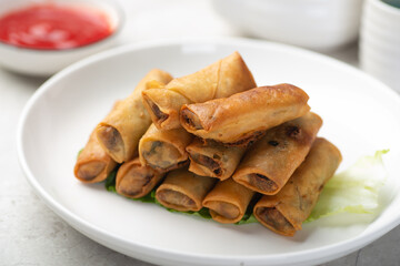 Delicious fried spring rolls and sweet chili sauce
