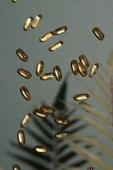 Many transparent pills Omega 3 fish oilon a colorful background. Health supplements and medicines