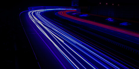 Night road lights. Lights of moving cars at night. long exposure multicolored
