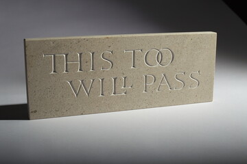 Hand carved lettering on limestone - This too will pass