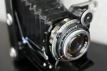 Fototapeta na wymiar Lens of an antique film rangefinder camera