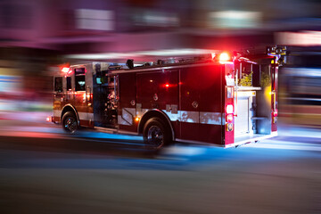A fire engine responds to the scene of an emergency.