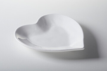 Heart shaped plate with white enamel