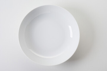 Simple round white serving plate