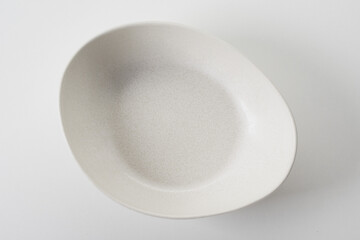 Empty curve ceramic dinner plate