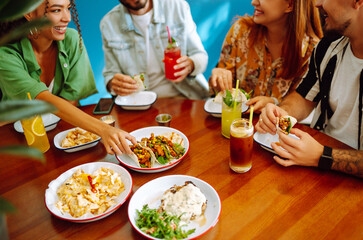 Food Table. Friendly dinner in a cafe.People, lifestyle, lunch, party, relax concept.