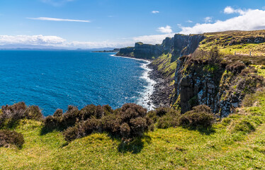 A panorama view towards the Kilt rocks and coastline on the Isle of Skye, Scotland on a summers day