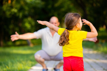 Cheerful man with his lovely girl spending the time together in the park and he is waiting for her...