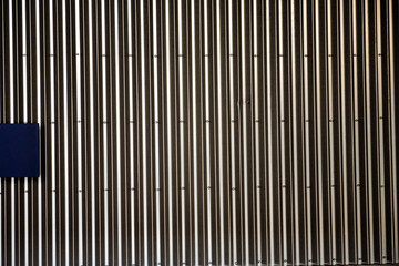 Metal decorations on the wall of metro station.