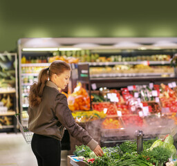 Woman buying fruits and vegetables  at the market