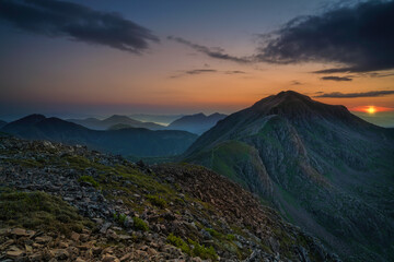 sunset at Bidean nam Bian mountain range, Glencoe, Highlands, Scotland, Uk.