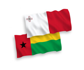 Flags of Malta and Republic of Guinea Bissau on a white background