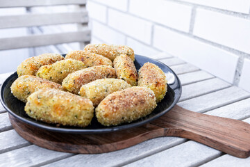Typical croquettes of Spanish cuisine. Traditional tapas of Spanish cuisine. Tapas plate with...