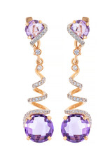Purple diamond earring set closeup macro on white background