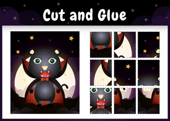 Children board game cut and glue with a cute black cat using halloween dracula costume