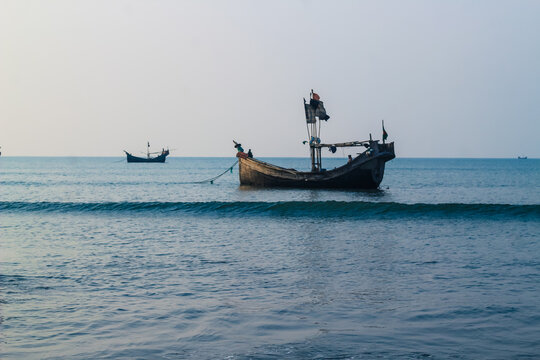 Photo of Industrial fishing boat. Fishing boat in the sea. The fishing industry in Bangladesh. Bangladeshi traditional fishing boat on St. Martin's Island.