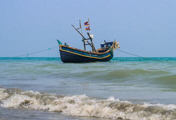 Fototapeta premium Photo of Industrial fishing boat. Fishing boat in the sea. The fishing industry in Bangladesh. Bangladeshi traditional fishing boat on St. Martin's Island.