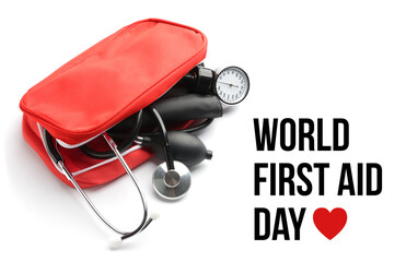 Bag with sphygmomanometer and stethoscope on white background. World First Aid Day