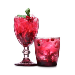 Glasses of fresh cocktails on white background