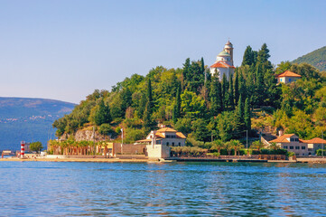 Summer Mediterranean landscape. Montenegro, Adriatic Sea, Bay of Kotor. View of Kamenari village and Church of Sveta Nedjelja