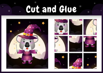 Fototapeta premium Children board game cut and glue with a cute koala using halloween costume