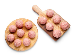 Wooden boards with raw cutlets made of fresh forcemeat on white background