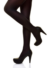 Female Legs in Black Stockings and Heels