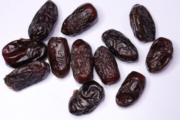 
Raw Organic Dates fruit isolated on a white background

