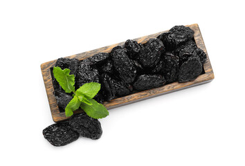 Board with tasty prunes on white background
