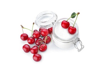 Glass jar with sugar and cherry on white background