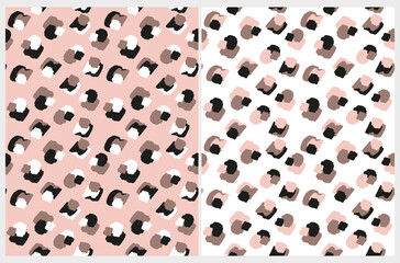 Abstract Leopard Skin Seamless Vector Patterns. Pink, Brown and Black Irregular Brush Spots on a White and Pink Backgrounds. Abstract Wild Animal Skin Print. Simple Irregular Geometric Design.