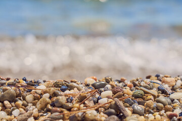 Pebble beach on the coast of Crete on the Aegean Sea.