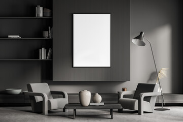 Dark grey living room with banner on lining panels, armchairs and lamp