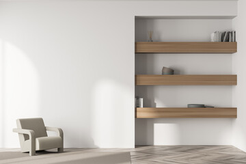 Armchair in the light beige waiting room with niche bookshelf © ImageFlow