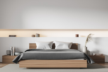 Bedroom with narrow niche in the white wall