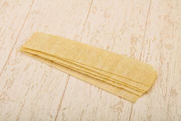 Natural salted potato chips heap