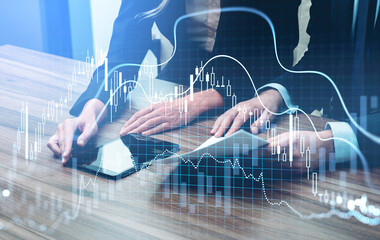 Businessman and businesswoman traders working together to develop new trading strategy. Stock market changes, business graph chart. Overlay. Concept of internet trading
