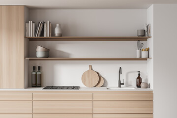 Light white kitchen cabinet with opened shelves. Close-up view