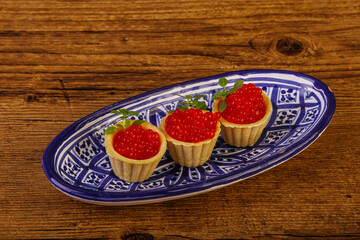 Apetizer - tartlet with red caviar