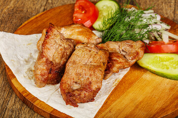 Grilled pork shashlick served vegetables