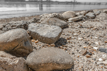 Fototapeta na wymiar Sandy beach, cobblestones and pebbles - 11