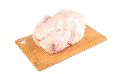 Whole fresh chicken on a cutting board over white background.